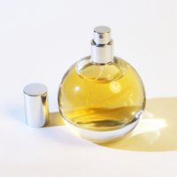 Capuchon en forme de galet Luxe en stock Flacon de parfum en verre irrégulier de 30ml en forme de goutte
