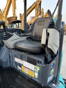 Excavadora hidráulica de cadenas Kobelco Sk30sr color verde azulado con orugas y cabina para uso en construcción - Product Image 4