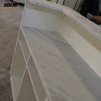 Mobilier de bureau moderne personnalisé pierre artificielle comptoir de réception à surface solide bureau de salon de beauté réception