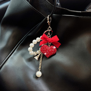 Porte-clés Pendentif Cœur Nœud Papillon Perle Diamant Pêche, Porte-clés de Voiture en Alliage Strass avec Chaîne de Perles pour Sac à Main - Product Image 3
