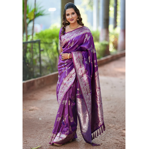 Regal <b>Purple</b> Banarasi Soft Silk <b>Saree</b> With Intricate Jaal Weave And Lustrous Zari Detailing Perfect For Celebrations - Product Image 1