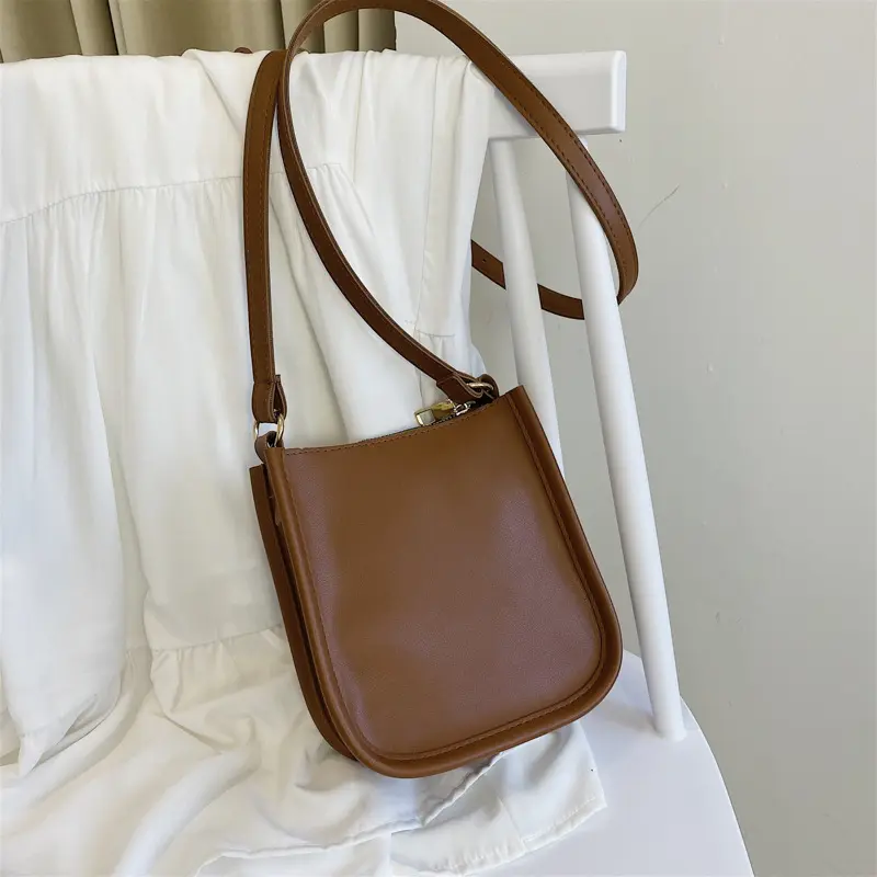 REWIN Fashion – portefeuille pour téléphone portable, sacs seau à bandoulière avec fermeture éclair sur le dessus, poches amples, petits sacs à bandoulière en cuir végétalien