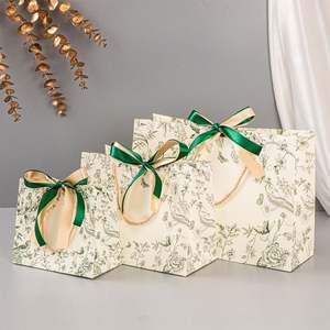 Sacs en papier haut de gamme en promotion : Nouveaux sacs cadeaux de fêtes, sacs à main vintage européens avec nœud, sacs à cosmétiques, sacs en papier - Product Image 4