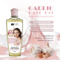 Huile capillaire légère à l'ail 200 ml, absorption rapide, sans résidus gras, pour des cheveux lisses et hydratés, convient aux cheveux secs