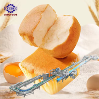 Ligne de production automatique de machines à fabriquer des gâteaux en forme de biscuit et de cupcake en éponge de nouvelle conception commerciale