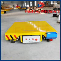 Chariot de camion à plat électrique robuste personnalisable chariot de transport en entrepôt chariot de transport sans rail pour le déplacement de l'usine de voitures plates