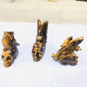 Groothandel Hoge Kwaliteit Crystal <span class=keywords><strong>Tiger</strong></span> <span class=keywords><strong>Eye</strong></span> Schedels Met Papegaai Kristal Unieke Carving Tijgeroog Standbeeld Voor Decoratie - Product Image 6