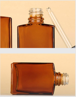 Flacon compte-gouttes rectangulaire en verre ambré 30ml 50ml 100ml pour huiles essentielles, sérums de soin et gouttes pour les yeux, avec impression de logo personnalisée