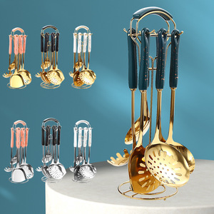 Juego de utensilios de cocina de acero inoxidable de 7 piezas con soporte para cocinar y servir - Product Image 1
