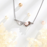 Vente en gros de pendentifs en cage avec perles en acier inoxydable, breloques pour collier, bracelet, etc.