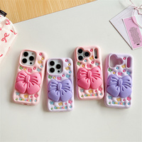 Coque de téléphone portable en silicone avec support romantique motif nœud de dessin animé pour iPhone 17 16 15 Pro Max, support papillon mignon, coque arrière en caoutchouc