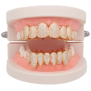 Unregelmäßige Zahnspangen für Männer und Frauen mit 4A Zirkon Eis 18 Karat Gold Zahnersatz kubanischen Hip Hop Schmuck