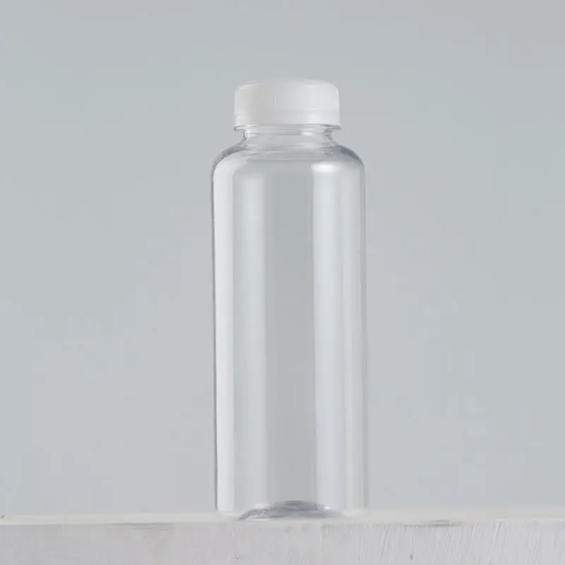ホット販売12オンス使い捨てクリア食品グレードペットプラスチックジュース360ミリリットルBeverage Bottleと白キャップ