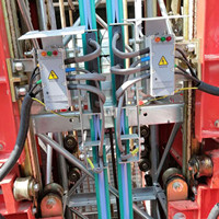 Rail conducteur dédié de 16 mm² pour contact coulissant de barre omnibus, destiné aux monte-charge de passagers de chantier