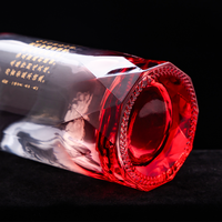 Les bouteilles de vin avec feuille imprimée d'or de dragon chinois sur le corps de bouteille peuvent être transformées en bouteilles de vin en verre entièrement transparentes