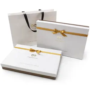 थोक अद्वितीय कस्टम मुद्रित लोगो Bowknot के साथ गत्ता प्रसिद्ध उपहार पैकेजिंग बॉक्स