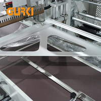 Machine d'emballage sous film rétractable électrique automatique GURKI GPL-5545DI pour l'emballage de boîtes en carton, les applications alimentaires et de boissons