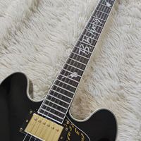 Guitare électrique noire de haute qualité avec corps en acajou, manche en érable, configuration de micros H-H, élégance et sophistication haut de gamme