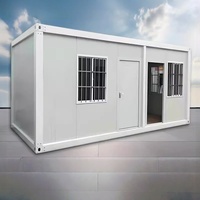 Maison conteneur préfabriquée démontable avec escalier extérieur en panneaux sandwich