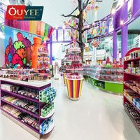 Comptoir de confiserie OUYEE personnalisé pour un montage facile, design de kiosque de centre commercial pour bonbons et sucettes, mobilier de présentation pour magasin de bonbons