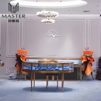Comptoir de bijouterie MASTER, design incurvé, vitrine élégante et luxueuse en verre, présentoir doré, table de présentation pour bijouterie