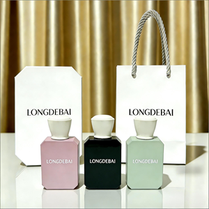 Luxury Custom Eco-friendly <b>Pink</b> Glass Perfume <b>Bottles</b> 30ml 50ml 100ml Irregular Black Shape with Screen Printed Box Packaging - Product Image 1