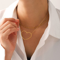 Collier minimaliste léger de luxe en forme de cœur creux en acier inoxydable PVD plaqué or 18K Chaîne de clavicule pour femme