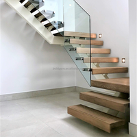 Escaliers flottants d'intérieur modernes avec garde-corps en verre Mono Stringer invisible durable pour la conception de structure en bois de hall d'utilisation d'appartement