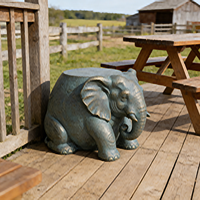 Tabouret de jardin en résine en forme d'éléphant - Finition bronze antique, siège extérieur ludique et base décorative pour les espaces de patio