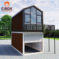 Cbox Maison conteneur modulaire préfabriquée à toit en pente, type dortoir capsule garage à deux étages, avec espace de stationnement double niveau et zone de vie