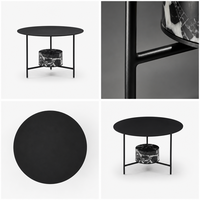 Table basse ronde sculpturale Noir Grand Siècle avec base tambour en pierre sablée noire, design de luxe personnalisable