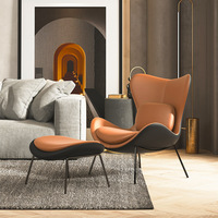 Fauteuil lounge en cuir tanné bicolore avec cadre en métal noir mat, dossier haut, coussin lombaire, ottoman en PU, pour extérieur, vente en gros, Sessel