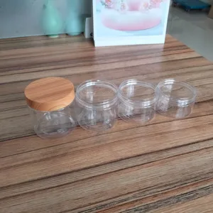 Rỗng mỹ phẩm Container 50ml 150ml 200ml 250ml 500ml rõ ràng Frosted Pet nhựa Jar với tre gỗ có nắp đậy