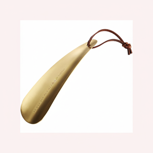 La conception ergonomique du chausse-pied en laiton massif Artisan rencontre le luxe pour un glissement facile avec la classe - Product Image 1