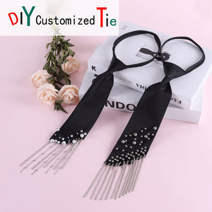 Corbata <span class=keywords><strong>de</strong></span> perlas <span class=keywords><strong>de</strong></span> acero con borlas informal transpirable hecha a mano a la moda para mujer <span class=keywords><strong>al</strong></span> por mayor versión coreana corbata perezosa sin anudar - Product Image 1