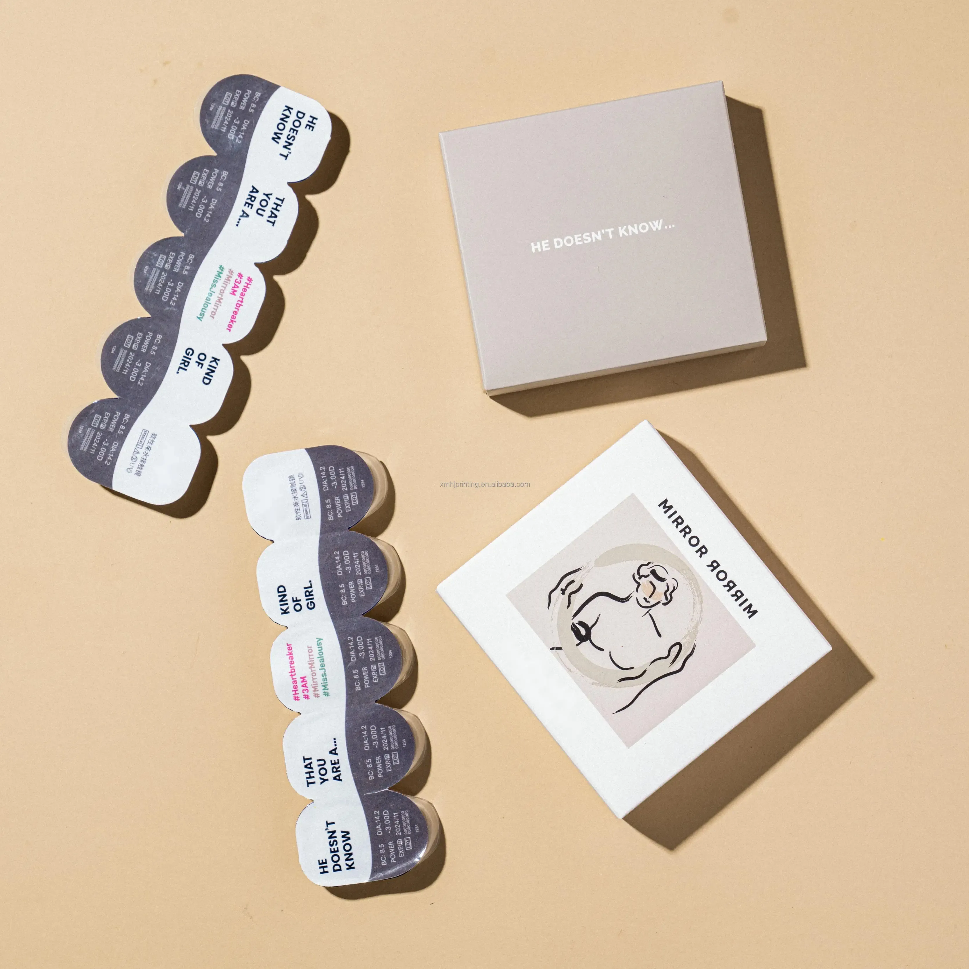 Boîte de papier d'emballage de lentilles de contact oculaires colorées en carton ivoire avec logo personnalisé en gros