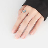 Bague ouverte anti-stress en argent sterling 925 avec zircone cubique et motif papillon rotatif