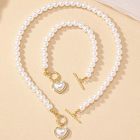 Ensemble de bijoux fantaisie vintage, collier ras du cou en perles baroques, pendentif cœur géométrique, bracelet pour femmes