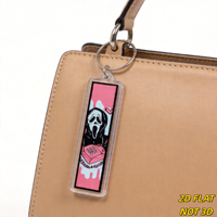 Porte-clés rose d'horreur avec masque hurlant de dessin animé, téléphone rétro et cœurs, style gothique Y2K en acrylique, parfait
