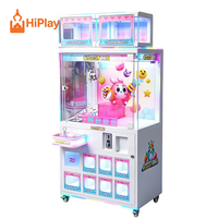 Machine de jeu d'arcade de luxe à griffes pour la remise de prix, avec vitrine de présentation de boîtes surprises, pour centre de divertissement familial