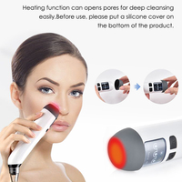 Extracteur de points noirs électrique en silicone avec fonction chauffante pour le traitement de l'acné et le nettoyage des pores du visage