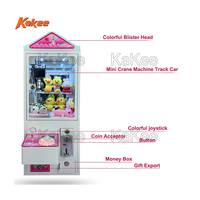 Machine populaire de grue à griffes à jetons pour la mini machine de grue d'arcade de peluches de pendentifs en peluche pliables