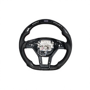 Volant en fibre de carbone pour Mercedes-Benz CLA Open Center Configuration sélectionnée MCLALD - Product Image 1