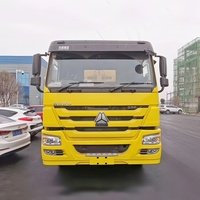 Promotion SINOTRUK HOWO 6x4 Camion benne à benne basculante 20 m³ avec bras hydraulique 20 tonnes pour déchets
