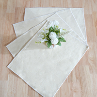 Chemin de table jacquard de couleur unie nappe en coton tissé de luxe avec pompon simple élégant à usage domestique disponible pour la vente en gros