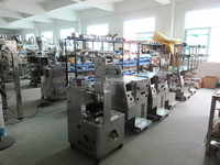 Machine de pesage, de remplissage et d'emballage automatique multifonctionnelle pour sachets de thé de qualité alimentaire, avec moteur de scellage de sacs