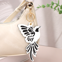 Breloque de sac à main en cuir PU tendance avec motif floral et ornement d'hirondelle, pendentif décoratif multi-usage, cadeau pour hommes et femmes
