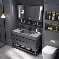 Grande unité de meuble-lavabo de salle de bain autoportante noire polie, style américain unique et intelligent, avec coiffeuse intégrée pour appartement