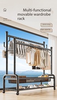 Porte-vêtements double à roulettes - Porte-vêtements moderne en métal avec rangement double couche pour chambre, salon et cuisine