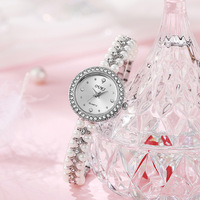 Bracelet-montre transfrontalier de luxe léger en forme de goutte d'eau avec perles, mouvement à quartz, style médiéval, design perlé fait main